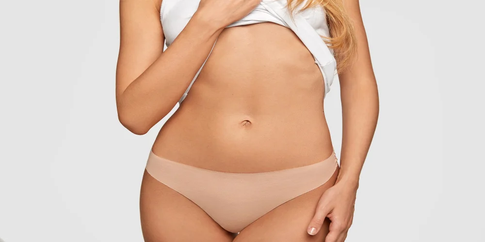 Imagem ilustrativa de barriga com alimentos
